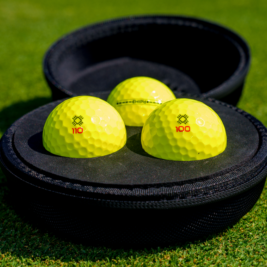 Three CHIP’d smart golf balls in their protective carrying case