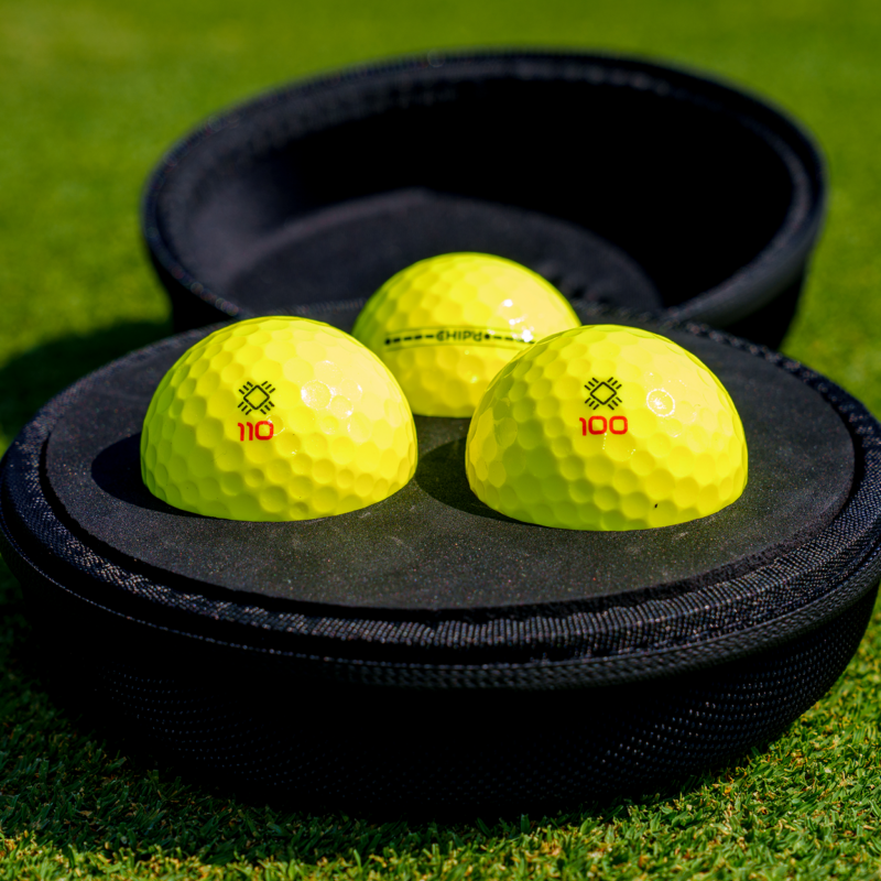 Three CHIP’d smart golf balls in their protective carrying case